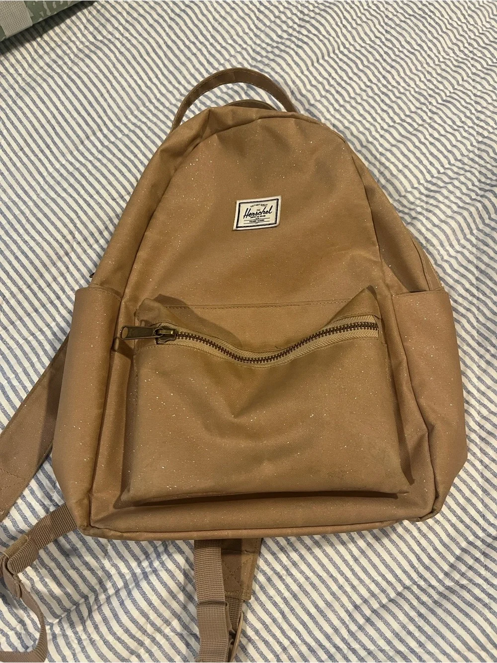 Herschel tan mini backpack